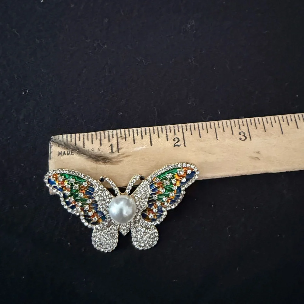 Elegant Multicolor Crystal Butterfly Brooch with Pearl Accent